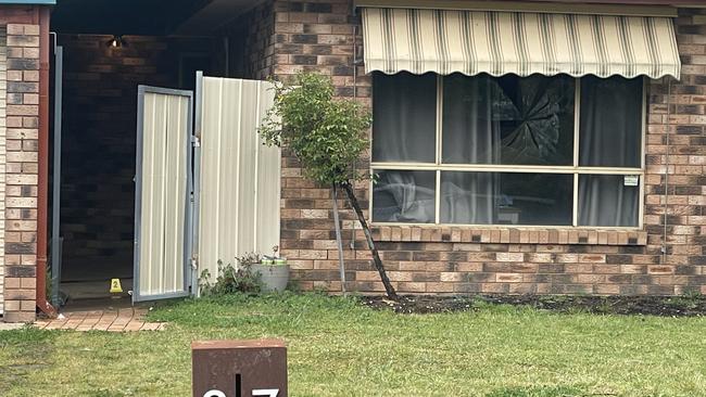A smashed window at the scene in Glenfield Park, Wagga Wagga where a man was stabbed. Picture: Kate Kiernan