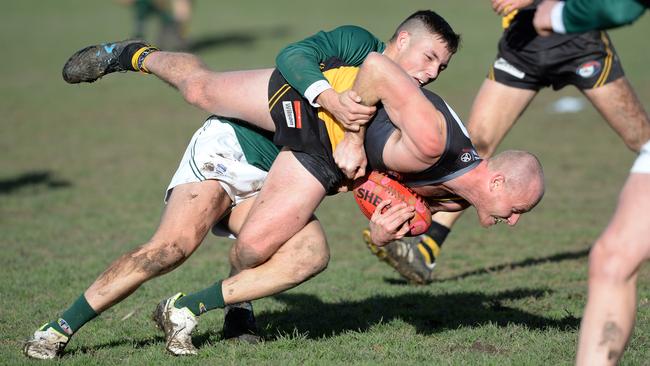 Billy Bedford tackles Chaz Sargeant. Picture: Chris Eastman