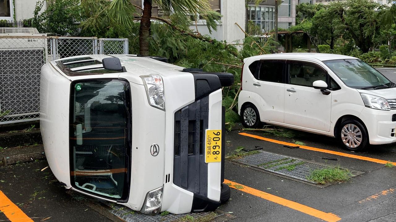 Toyota, Nissan, and Honda halted operations, and over 500 flights were cancelled due to the storm. Picture: AFP