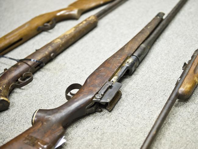 LOADED GUN: A farmer has left a loaded rifle in clear view on a child's bed.