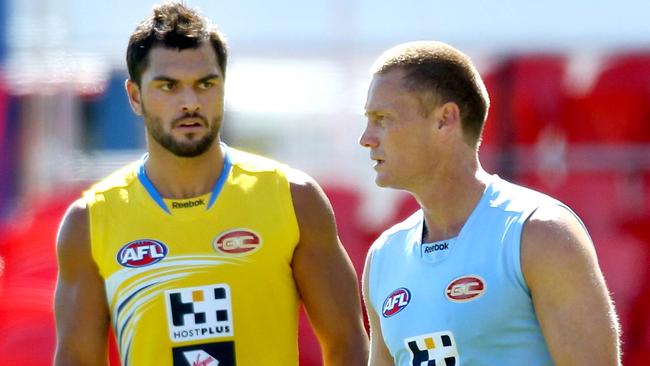 Hunt and McKenna talk tactics at Suns training. Picture: Luke Marsden