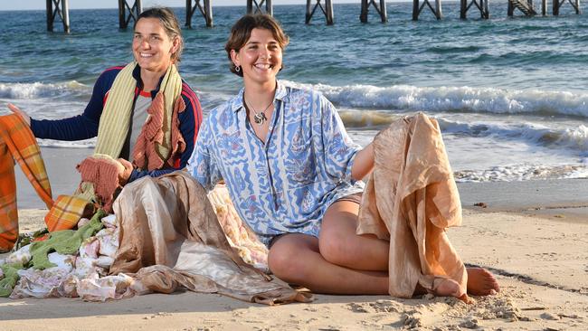 Artists Isadore Glockner-Karo and Heidi Karo pose for a photograph at Port Noarlunga, Adelaide on Wednesday the 2nd of October 2019. The mother-daughter duo have an interactive performance piece, "Harvest" as part of the SUE Festival during October.   (AAP/Keryn Stevens)