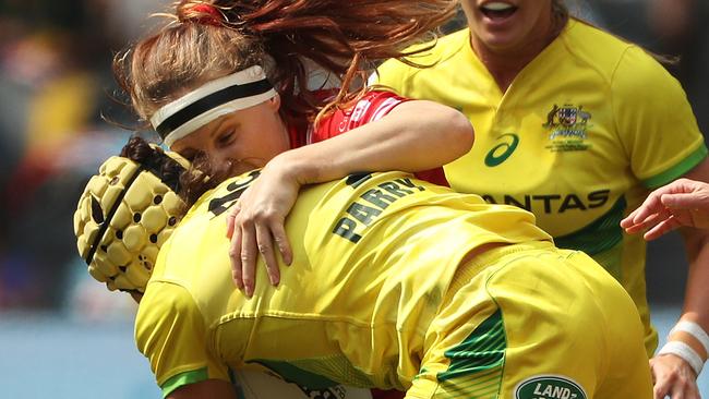 Shannon Parry tackled during Australia's loss to Canada the 2020 Sydney Rugby 7s.