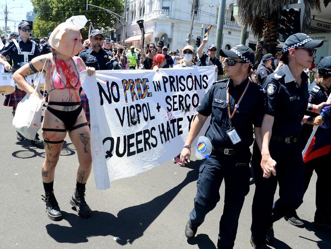 A small group of protesters clash with police who were marching in the Midsumma Pride Parade along Fitzroy Street St Kilda. Picture: Andrew Henshaw