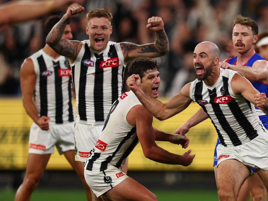 Steele Sidebottom wheels off in celebration after his matchwinner.