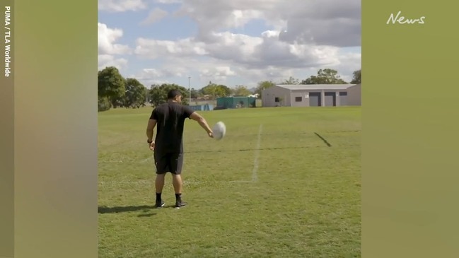 Jason Taumalolo performs trick shots with young trickster