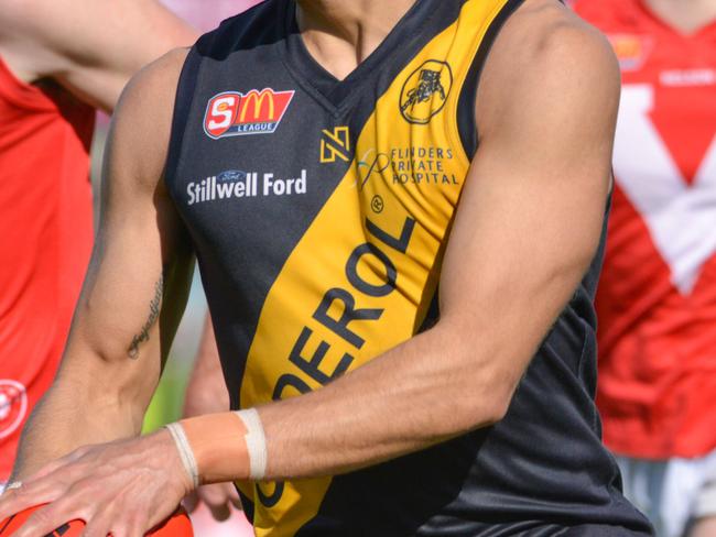 SANFL, Glenelg v North Adelaide at Gliderol Stadium, Saturday, August 19, 2017. Dom Barry from Glenelg sprints away. (AAP Image/Brenton Edwards)