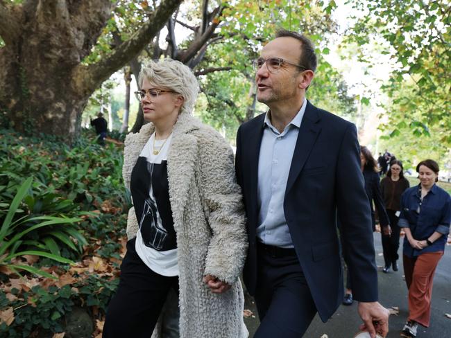 Adam Bandt with his wife Claudia before officially conceding the seat of Melbourne on Thursday. Picture: David Crosling