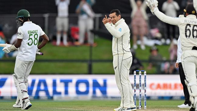 Ross Taylor celebrates his third and final Test wicket. Photo by Kai Schwoerer/Getty Images