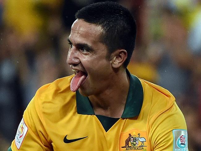 Australia's Tim Cahill celebrates his second goal during the AFC Asian Cup quarter-final football match between Australia and China in Brisbane on January 22, 2015. AFP PHOTO / Saeed KHAN --IMAGE RESTRICTED TO EDITORIAL USE - STRICTLY NO COMMERCIAL USE--