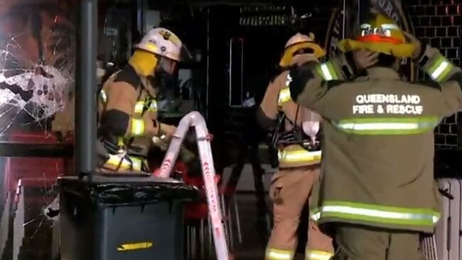 Firefighters at Grubbies’ Redbank Plains restaurant which was damaged in a suspected arson attack. Picture: 9 News