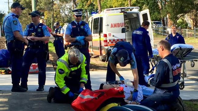 Emergency services at Pitt Town Rd, Kenthurst where a tradie was attacked by three dogs this morning. Photo: CareFlight