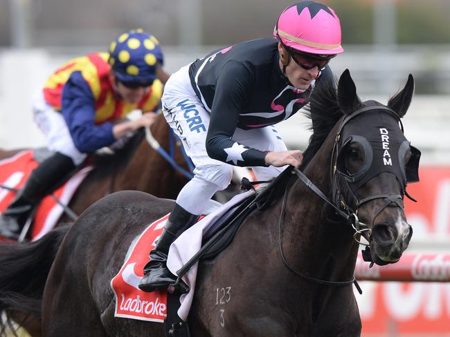Jockey Mark Zahra on MR Sneaky wins Race 3 The Hockingstuart Plate on Memsie Stakes Day at Caulfield Racecourse in Melbourne, Saturday, September 2, 2017. (AAP Image/Mal Fairclough) NO ARCHIVING, EDITORIAL USE ONLY