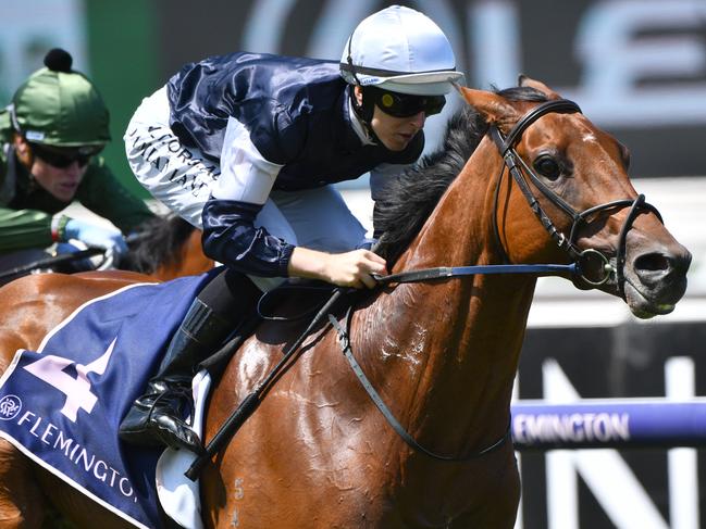Jockey Damian Lane rides King Of Leogrance to victory in the Roy Higgins Quality on Australian Guineas Day at Flemington on Saturday. Picture: AAP Image/Vince Caligiuri