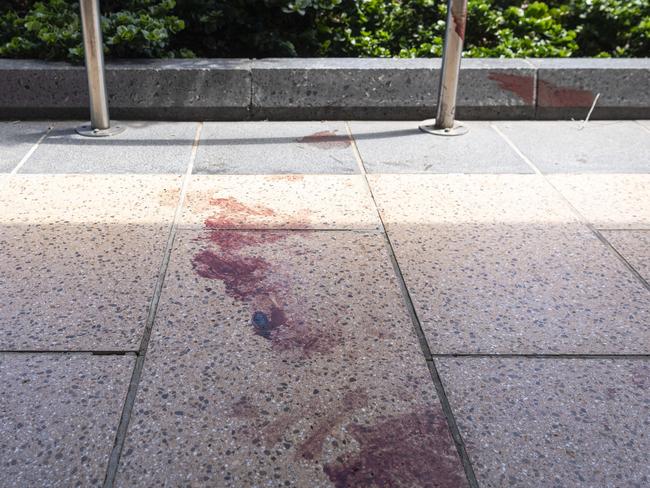 The intersection of Ruthven and Russell Sts in the Toowoomba CBD where a person was assaulted, unconfirmed blood stains are seen on the pavement, Sunday, November 24, 2024.