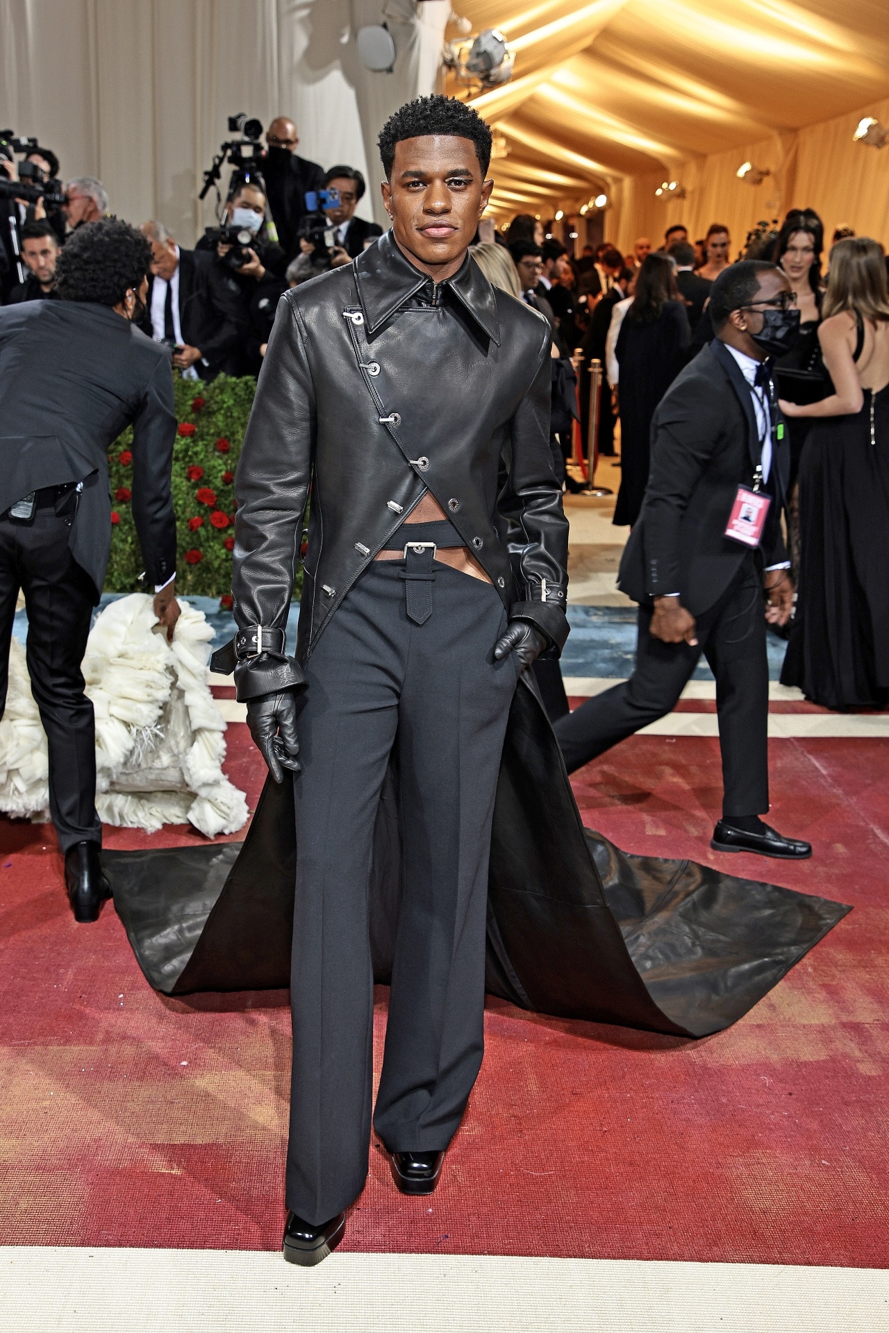 <h2><b>Jeremy Pope in Dion Lee at the 2022 Met Gala</b></h2><p><b><i>Theme: </i></b><i>In America: An Anthology of Fashion</i></p><p>For the second part of the Metropolitan Museum’s curatorial series ‘In America’, actor Jeremy Pope wore a custom look from Australian designer Dion Lee. The ensemble was an exercise in signatures from Lee, who demonstrated his taste for genderless, contemporary silhouettes in a leather double-breasted overcoat and buckled, low waisted pants. Asymmetric button closures, belted cuffs and a split train also added detail to the sensual, strongly tailored utilitarianism that Lee has become known for.</p>