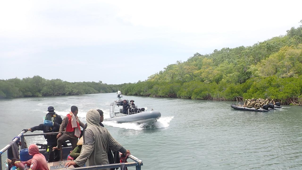 A photo taken in January of Australian Border Force officers intercepting an illegal fishing boat in Top End waters. Picture: ABF