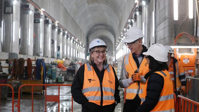 Deputy Premier Jacinta Allen talks to site managers underground at Town Hall station. Picture: David Crosling