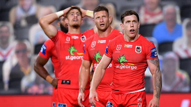 Shellshocked Dragons players watch another game slip away, against the Bulldogs at Bankwest Stadium on Monday night. Picture: AAP