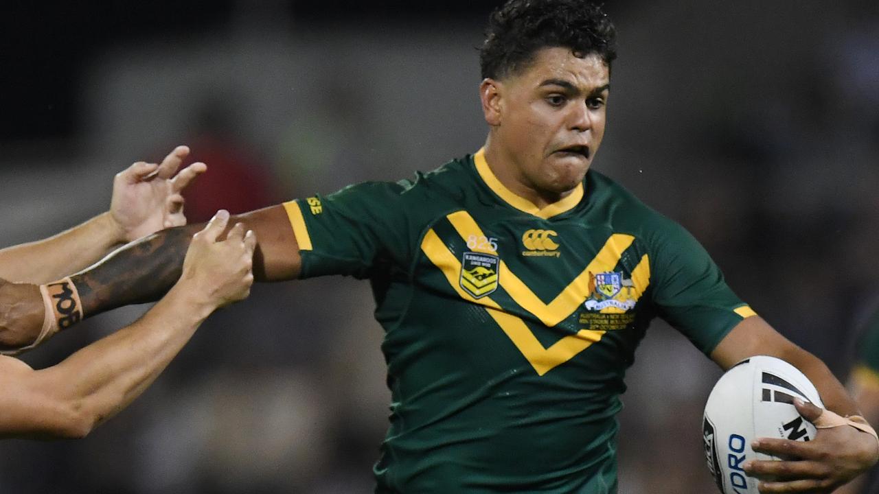 Latrell Mitchell of the Kangaroos fends off Joseph Manu of the Kiwis during the Oceania Cup Test Match between Australia and New Zealand at WIN Stadium in Wollongong, Friday, October 25, 2019. (AAP Image/Dean Lewins) NO ARCHIVING, EDITORIAL USE ONLY