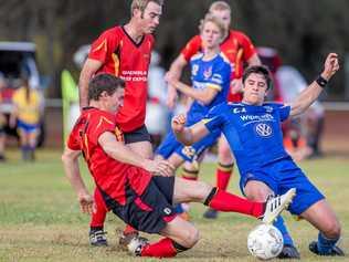 TOUGH BATTLE: Gatton's Adam Jackwitz (left) and USQ's Alex Dyball compete for the ball. Picture: Paul Smith