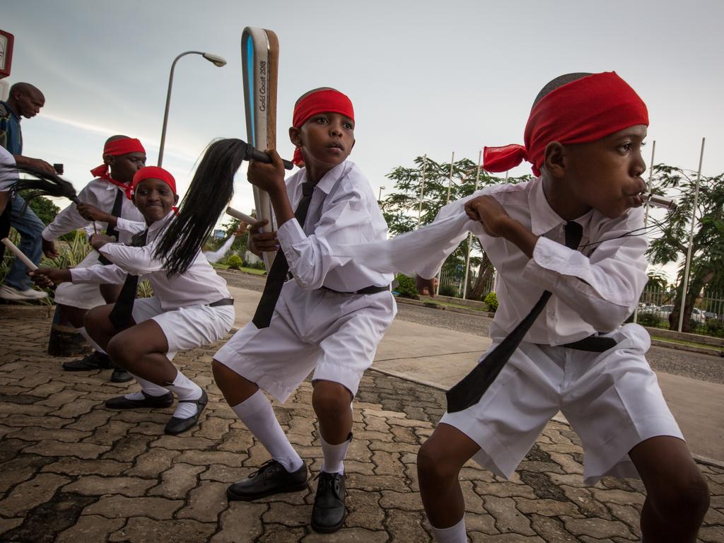 Schoolchildren from the Filbert Bay School greet the Queen’s Baton as it arrives in Dar Es Salaam, in Tanzania, on 8 April 2017.