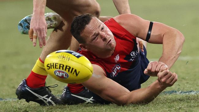 Melbourne's Steven May handballs. Picture. Phil Hillyard