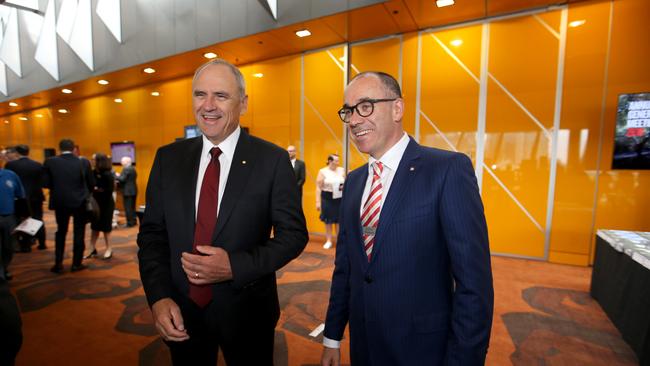 19/12/2018 NAB Chairman Ken Henry and CEO Andrew Thorburn chat with shareholders before the AGM at Melbourne Convention Centre.Picture : David Geraghty / The Australian.