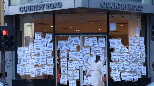 Country Road’s Chapel street store was hit with protest posters over the head office’s handling of harassment and bullying claims. Picture: David Caird