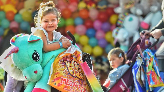 Royal Melbourne Show. Kids are winners as Ellie Anderson, 4 shows off her toys and showbags. Picture: Tony Gough