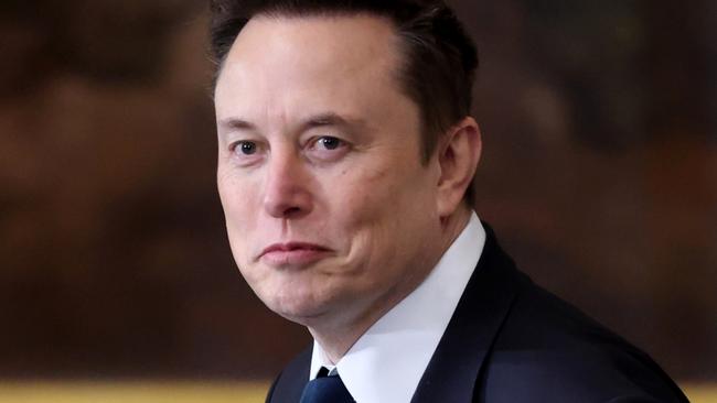 WASHINGTON, DC - JANUARY 20: Tesla, SpaceX and X CEO Elon Musk arrives for the Inauguration of Donald J. Trump in the U.S. Capitol Rotunda on January 20, 2025 in Washington, DC. Donald Trump takes office for his second term as the 47th president of the United States. (Photo by Kevin Lamarque - Pool/Getty Images)