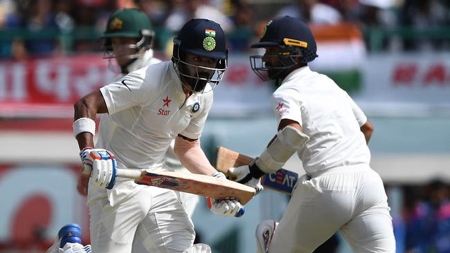India's Ajinkya Rahane (R) and Lokesh Rahul guided India to victory.