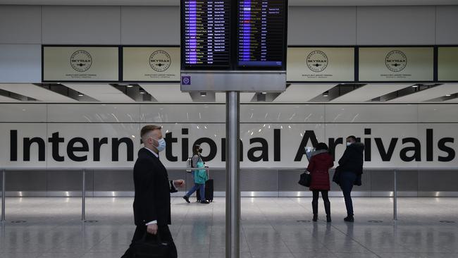 Travellers arrive at Heathrow Airport. Picture: Hollie Adams/Getty