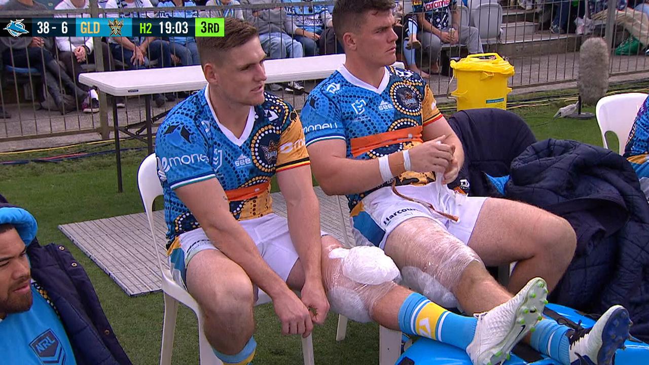 AJ Brimson watches on from the sideline with a knee injury.