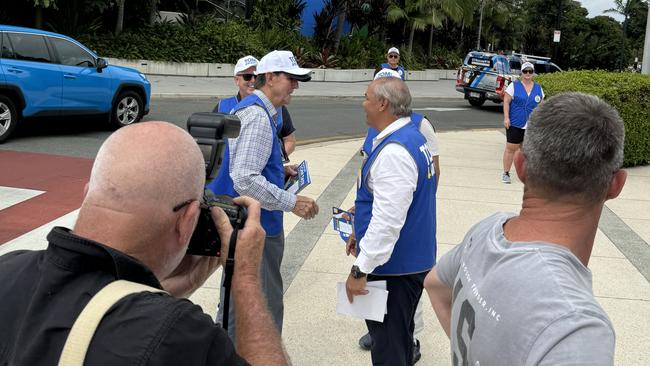 Mayor Tom Tate meets former Gold Coast mayor Gary Baildon at the Evandale polling booth on election day 2024. Picture: Andrew Potts