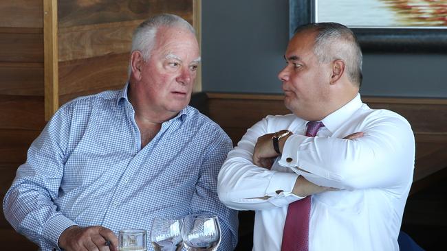 Destination Gold Coast chairman Paul Donovan and Mayor Tom Tate deep in conversation at a roundtable last year. Picture Glenn Hampson