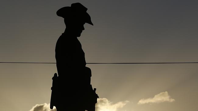 Figure of the digger. Dee Why Beach Dawn Service for ANZAC Day. Picture: John Appleyard