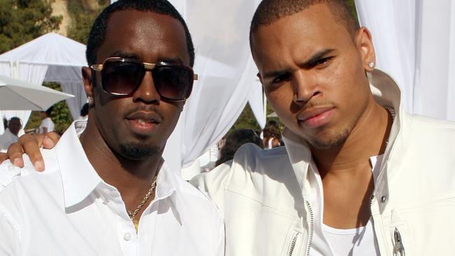 Sean "Diddy" Combs with singer Chris Brown at one of the rapper turned mogul’s parties in 2009. Brown has not been linked to any wrongdoing. Photo: Jason Merritt/Getty Images/Getty Images for Blueflame.