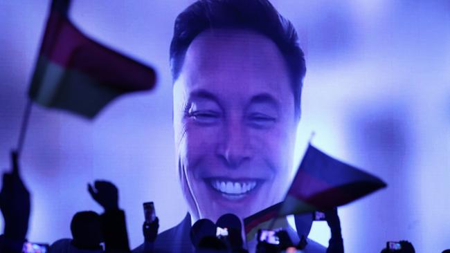 Elon Musk speaks live via a video transmission during the election campaign launch rally of the far-right Alternative for Germany (AfD) political party. (Photo by Sean Gallup/Getty Images)