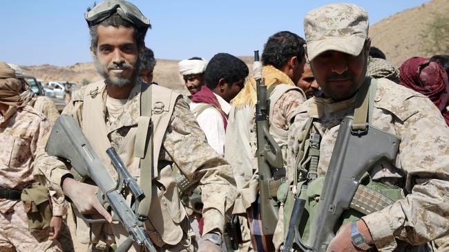 Armed ... Yemeni tribesmen from the Popular Resistance Committees hold a position in the area of Sirwah, west of Marib city. Picture: AFP/Abdullah Al-Qadry