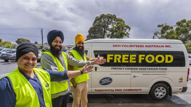 Sikh volunteers, including Sukhwinder Kaur, Chara Singh and Tejinder Singh, have launched a food van to feed the homeless. Picture: Valeriu Campan