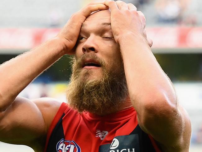 MELBOURNE, AUSTRALIA - MARCH 25:  Max Gawn of the Demons looks dejected after losing the round one AFL match between the Melbourne Demons and the Geelong Cats at Melbourne Cricket Ground on March 25, 2018 in Melbourne, Australia.  (Photo by Quinn Rooney/Getty Images)