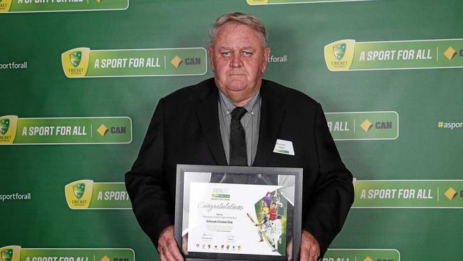 YOU BEAUTY: Mick Davis with the award at the MCG. Picture: Scott Barbour - CA