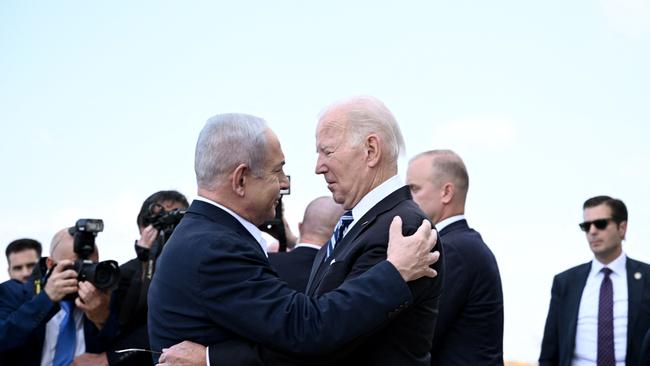 Israel Prime Minister Benjamin Netanyahu (L) greets US President Joe Biden upon his arrival at Tel Aviv's Ben Gurion airport on October 18, 2023, amid the ongoing battles between Israel and the Palestinian group Hamas. Picture: Brendan Smialowski/AFP