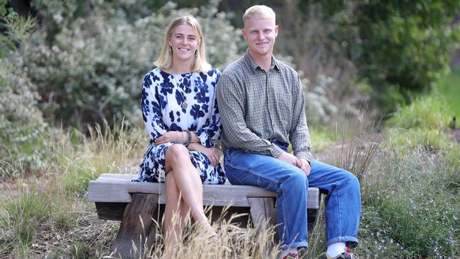 Grace Bishop and Finlay Roy, both 22 from the UK, are backpacking through Australia and want to volunteer in the bushfire recovery areas. Picture: Stuart McEvoy