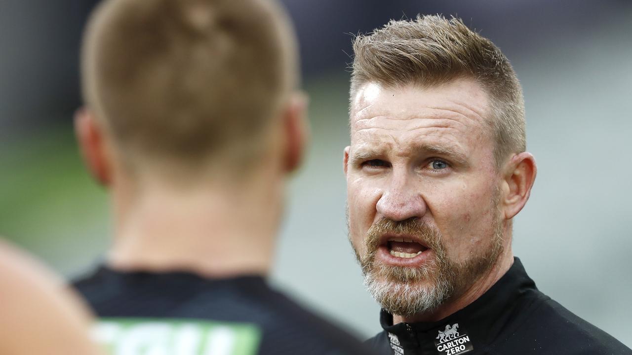 MELBOURNE, AUSTRALIA - MAY 29: Senior coach Nathan Buckley of the Magpies addresses his players during the 2021 AFL Round 11 match between the Collingwood Magpies and the Geelong Cats at the Melbourne Cricket Ground on May 29, 2021 in Melbourne, Australia. (Photo by Dylan Burns/AFL Photos via Getty Images)