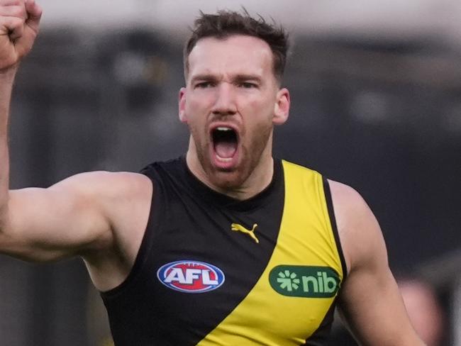 MELBOURNE, AUSTRALIA - JUNE 30: Noah Balta of the Tigers celebrates kicking a goal during the round 16 AFL match between Richmond Tigers and Carlton Blues at Melbourne Cricket Ground, on June 30, 2024, in Melbourne, Australia. (Photo by Daniel Pockett/Getty Images)