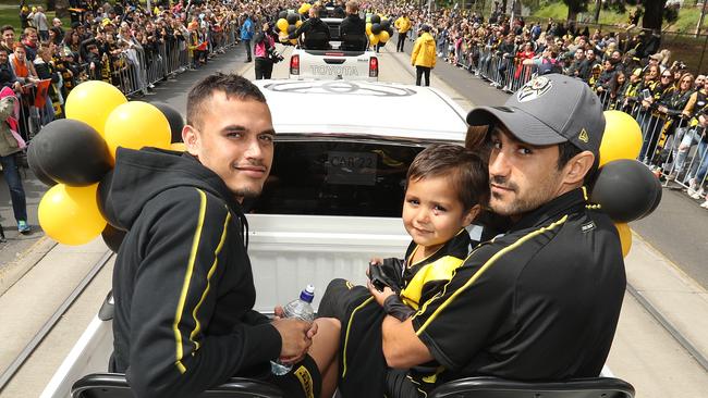 Sydney Stack with Marlion Pickett (right) at this year’s Grand Final Parade – a day after Pickett learned of his AFL debut. Pic: Getty Images