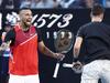 MELBOURNE, AUSTRALIA - JANUARY 21: Nick Kyrgios of Australia and Thanasi Kokkinakis of Australia react in their second round doubles match against Nikola Mektic of Croatia and Mate Pavic of Croatia during day five of the 2022 Australian Open at Melbourne Park on January 21, 2022 in Melbourne, Australia. (Photo by Darrian Traynor/Getty Images)
