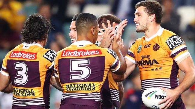 SYDNEY, AUSTRALIA — AUGUST 25: Corey Oates of the Broncos celebrates with his team mates after scoring a try during the round 24 NRL match between the Sydney Roosters and the Brisbane Broncos at Allianz Stadium on August 25, 2018 in Sydney, Australia. (Photo by Mark Kolbe/Getty Images)